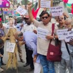 SIR में गड़बड़ी और दिल्ली में पुलिस कार्रवाई के विरोध में धनबाद में अमित शाह का पुतला दहन